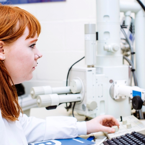 Female student on computer in biology lab